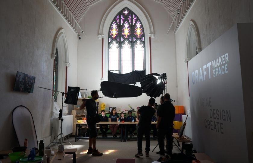 photo of film crew looking at cameras in CRAFT set 