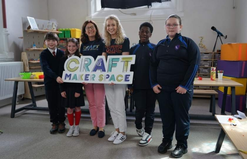 Children with Eleanor and Maeve with the CRAFT Sign
